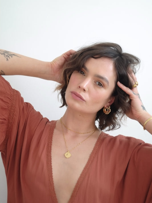 The Talisman Compass & Flora Delicate Chain Necklace Set in 18k Gold Plated Stainless Steel.