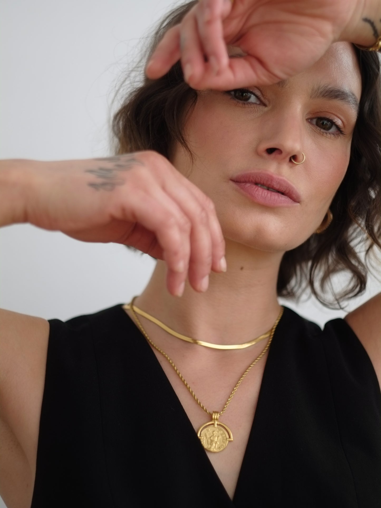 The Talisman Collection 18k Gold Plated Stainless Steel Coin Pendant Necklace.