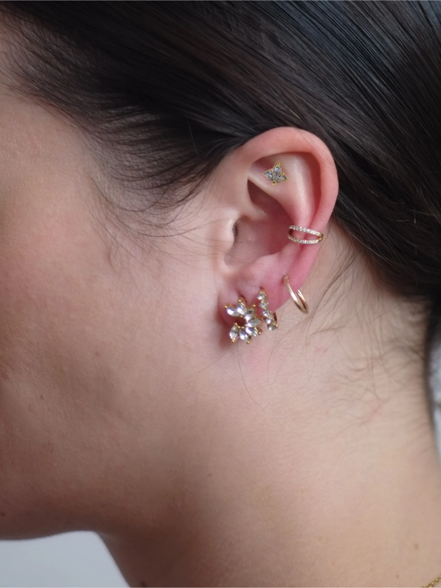 The Blake 18k Gold Plated Titanium Steel Cubic Zirconia Cluster Cartilage Lobe Stud Earring in Blue.