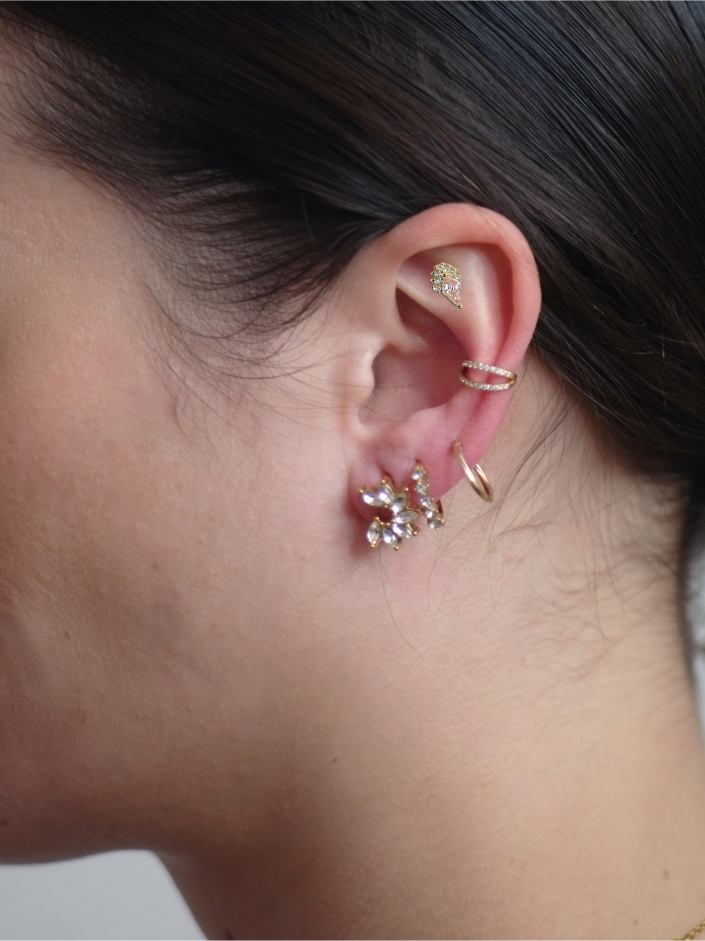 The Jordan 18k Gold Plated Titanium Steel Diamond Cut Crystal Dagger Cartilage Lobe Ball Back Stud Earring in Pink Cubic Zirconia.