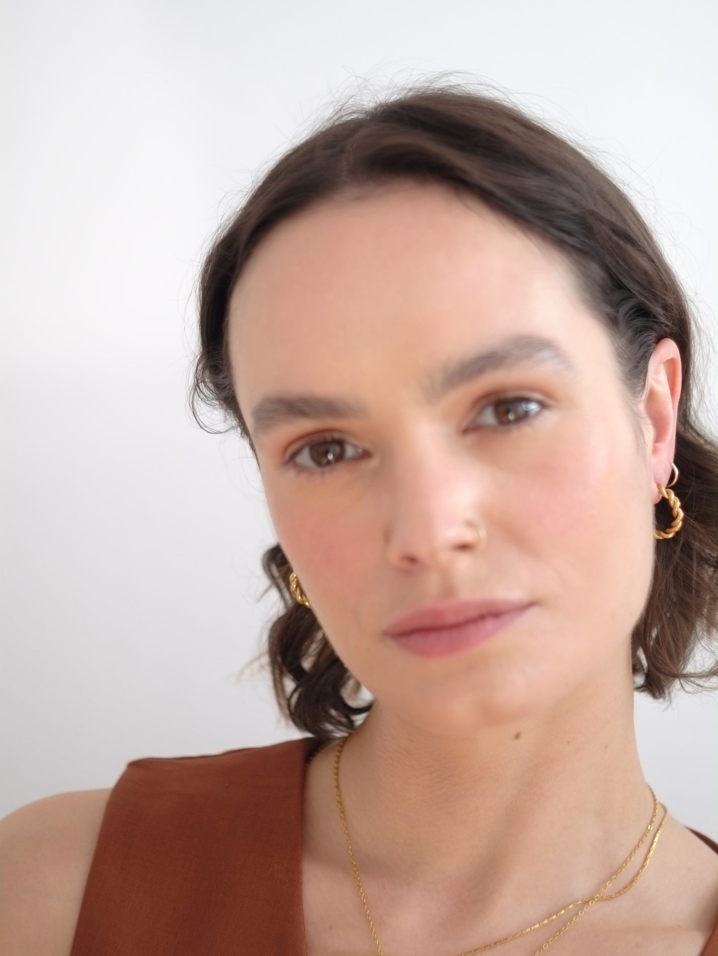 The Bali Collection 18k Gold Plated Stainless Steel Plaited Hoop Earrings.