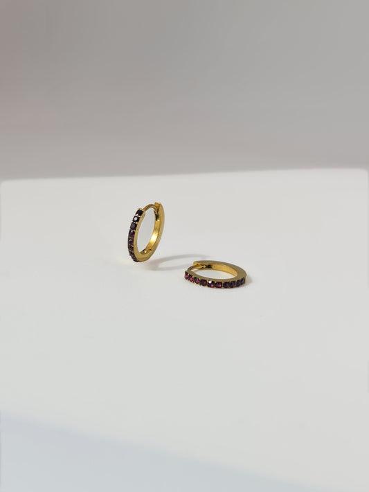 The Maija 'July' Ruby Birthstone 18k Gold Plated Stainless Steel Crystal Huggie Hoop Earrings.