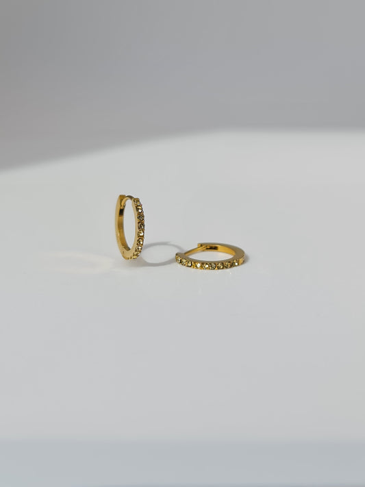 The Maija 'November' Citrine Birthstone 18k Gold Plated Stainless Steel Crystal Huggie Hoop Earrings.