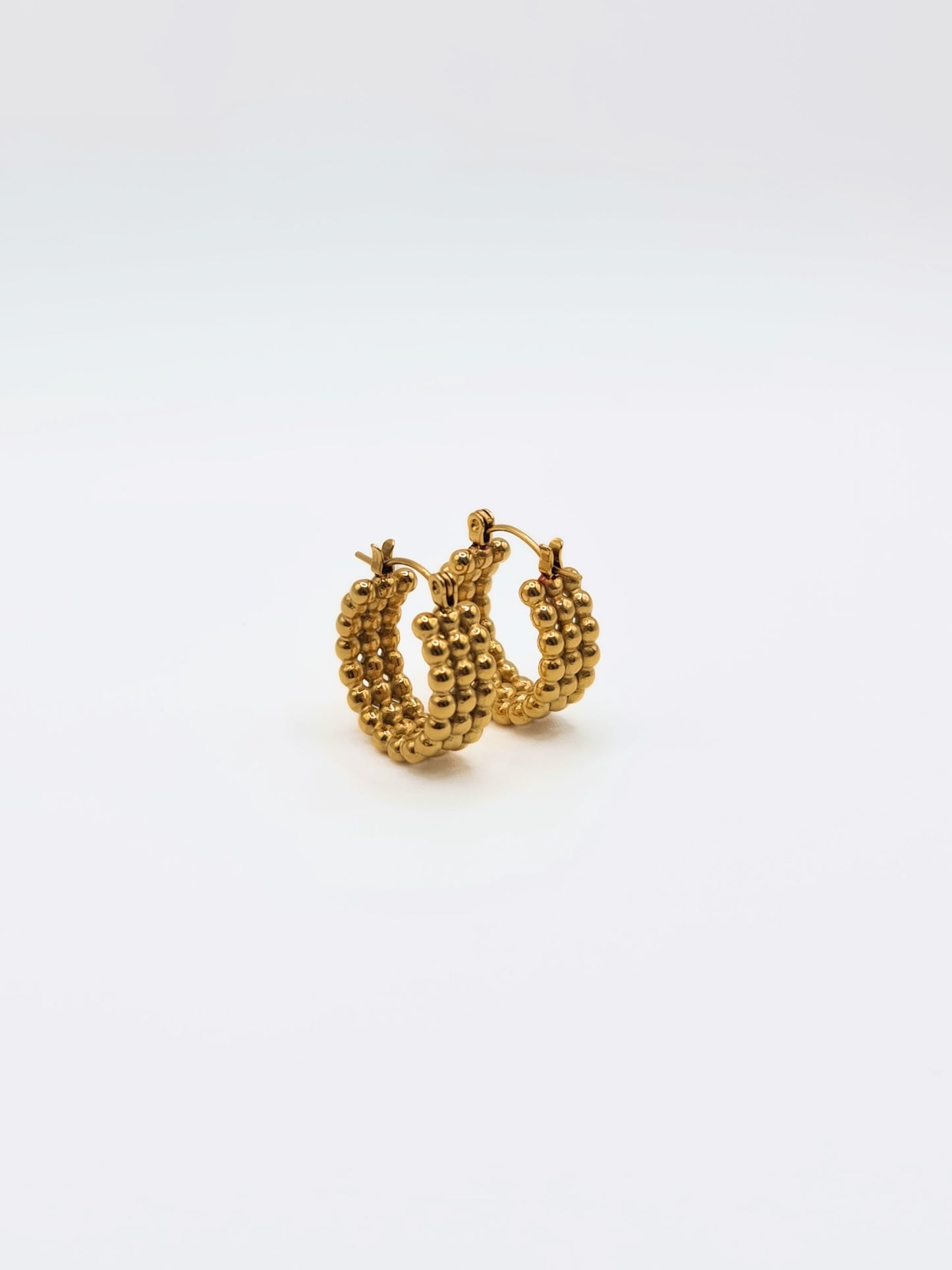 The Talisman Collection 18k Gold Plated Stainless Steel Beaded Hoop Earrings.