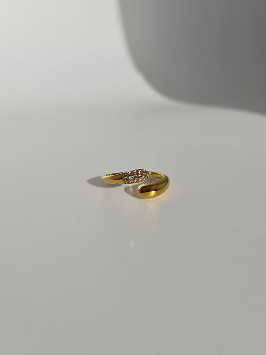 The Twist 18k Gold Plated Stainless Steel Pave Crystal Dome Open Band Stacking Ring.
