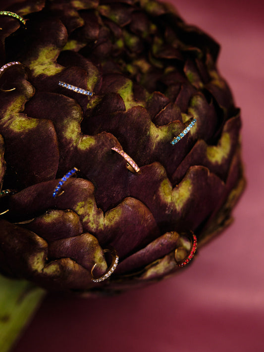 The Maija 'October' Tourmaline Birthstone 18k Gold Plated Stainless Steel Crystal Huggie Hoop Earrings.