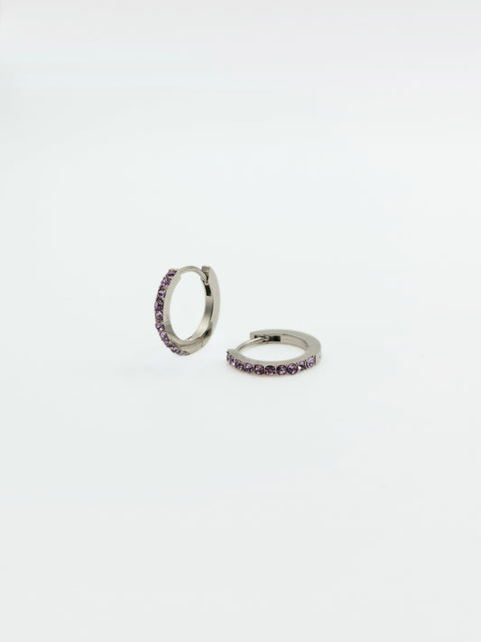 The Maija 'February' Amethyst Birthstone Silver Finish Tarnish Free Crystal Huggie Hoop Earrings.