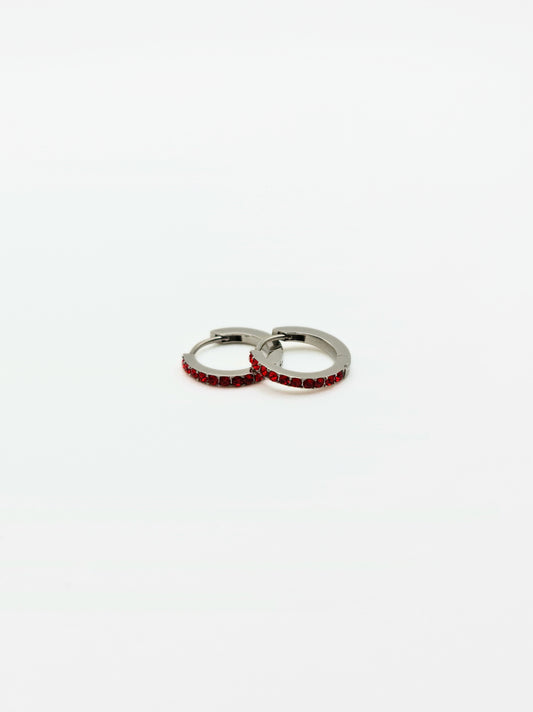 The Maija 'January' Garnet Birthstone Silver Finish Tarnish Free Crystal Huggie Hoop Earrings.