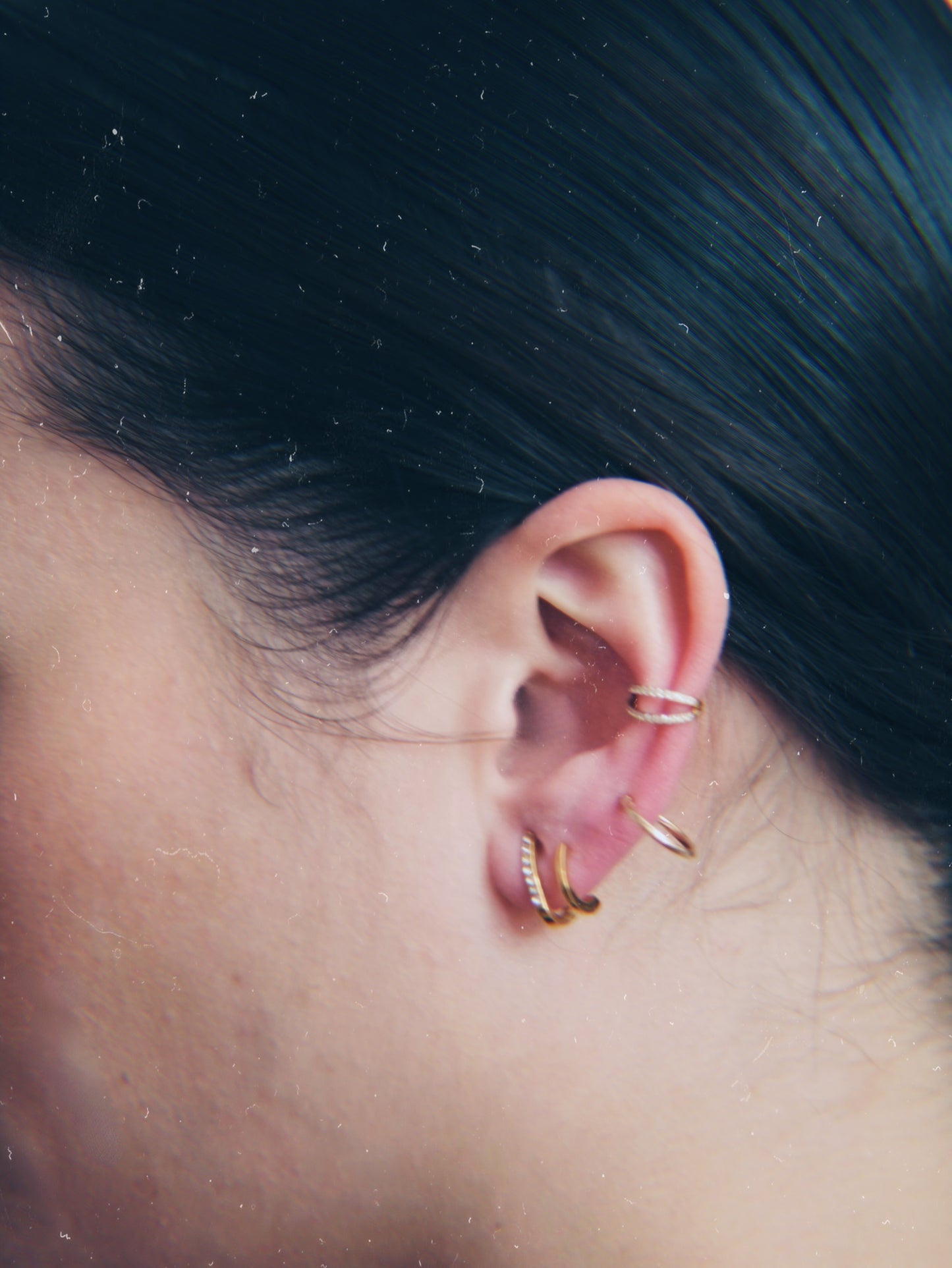 The Illusion 18k Gold Plated Stainless Steel Pave Crystal Double Hoop Earrings.