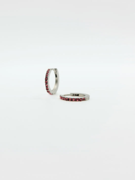 The Maija 'October' Tourmaline Birthstone Silver Finish Tarnish Free Crystal Huggie Hoop Earrings.