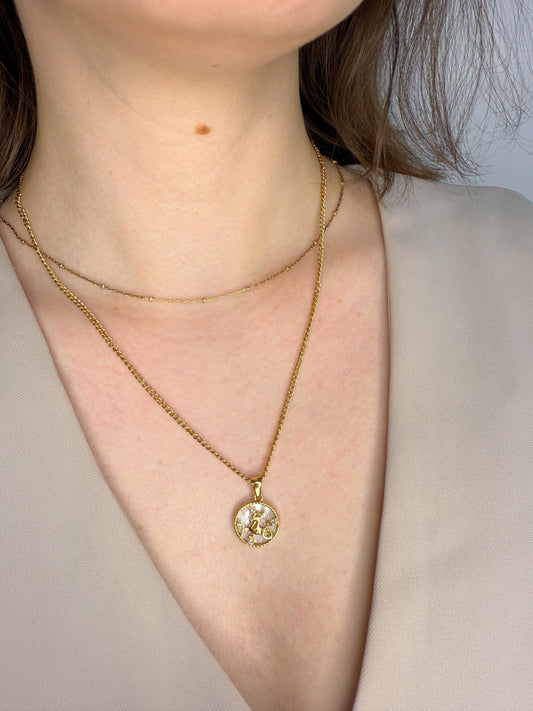 The Blair Capricorn 18k Gold Plated Stainless Steel Zodiac Starsign Pearlescent Necklace.