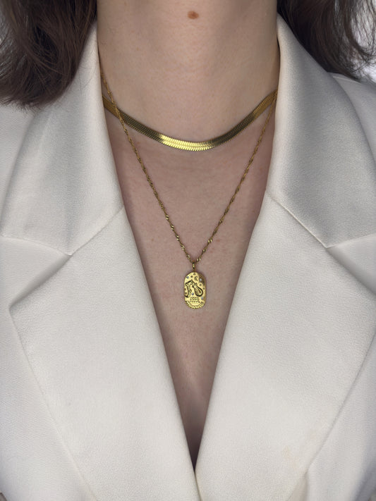 The Kiki Aquarius 18k Gold Plated Stainless Steel Zodiac Starsign Crystal Necklace.