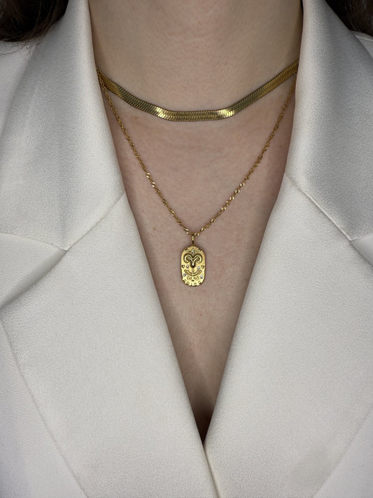 The Kiki Aries 18k Gold Plated Stainless Steel Zodiac Starsign Crystal Necklace.