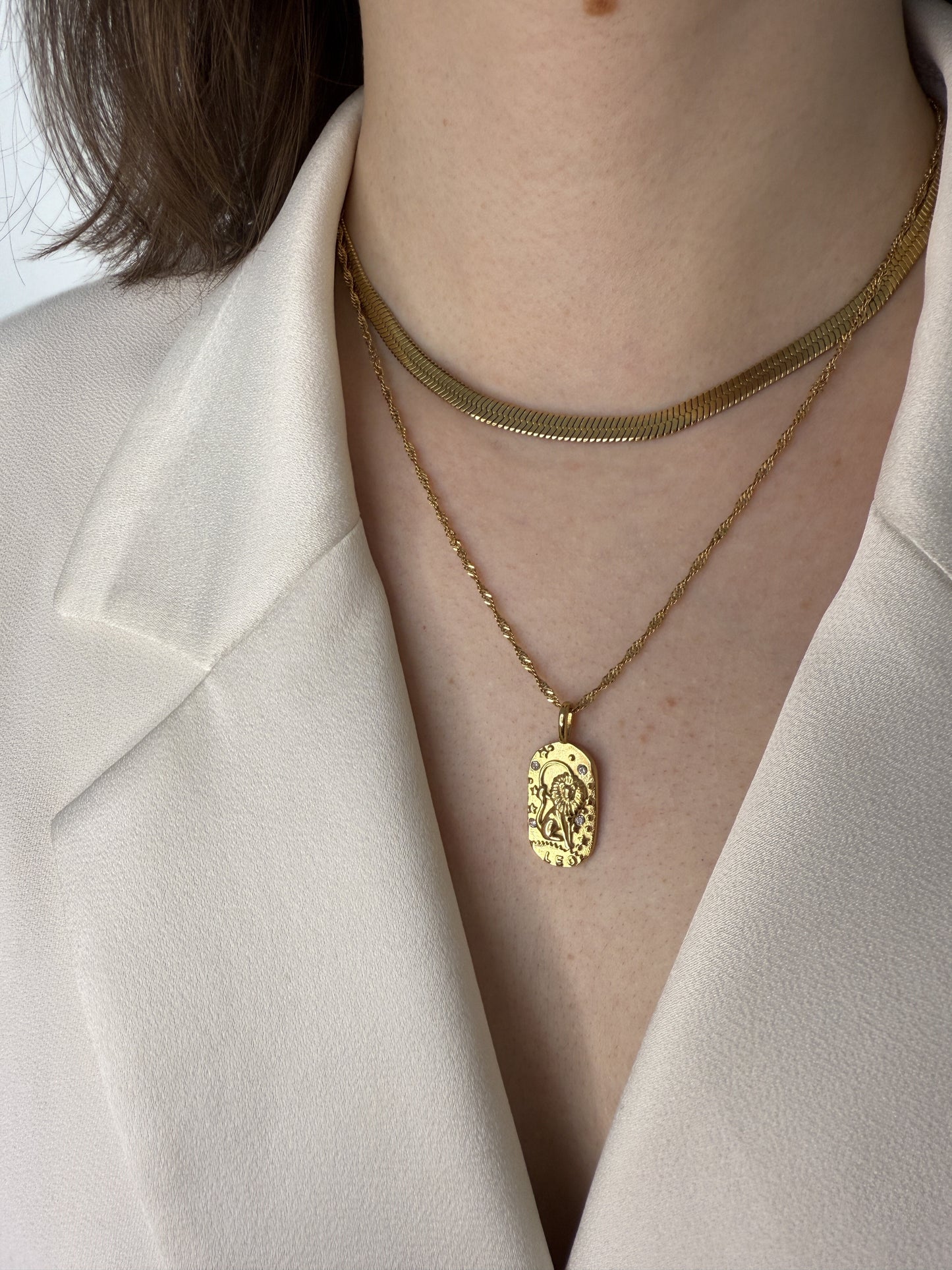 The Kiki Leo 18k Gold Plated Stainless Steel Zodiac Starsign Crystal Necklace.