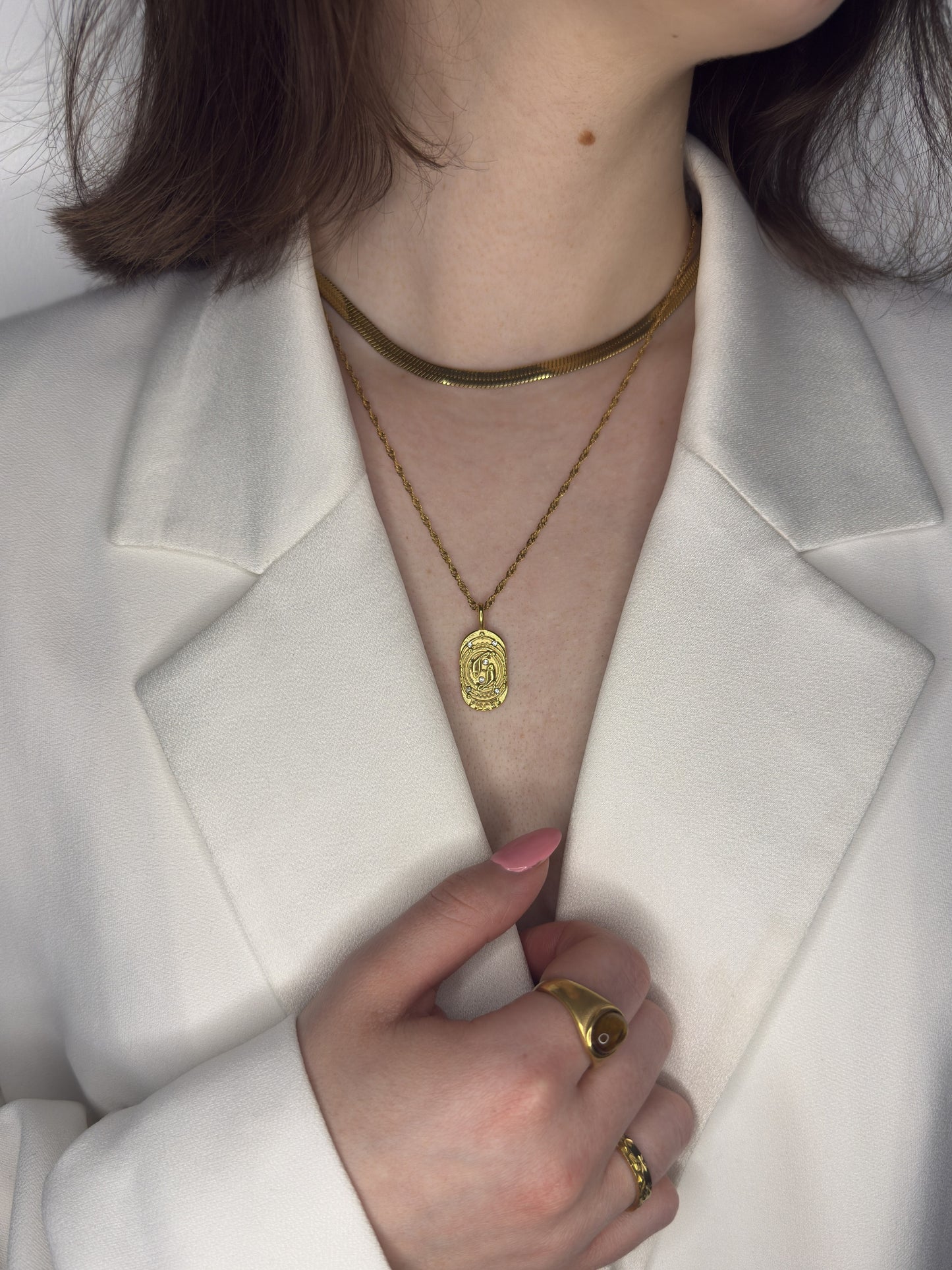 The Kiki Pisces 18k Gold Plated Stainless Steel Zodiac Starsign Crystal Necklace.