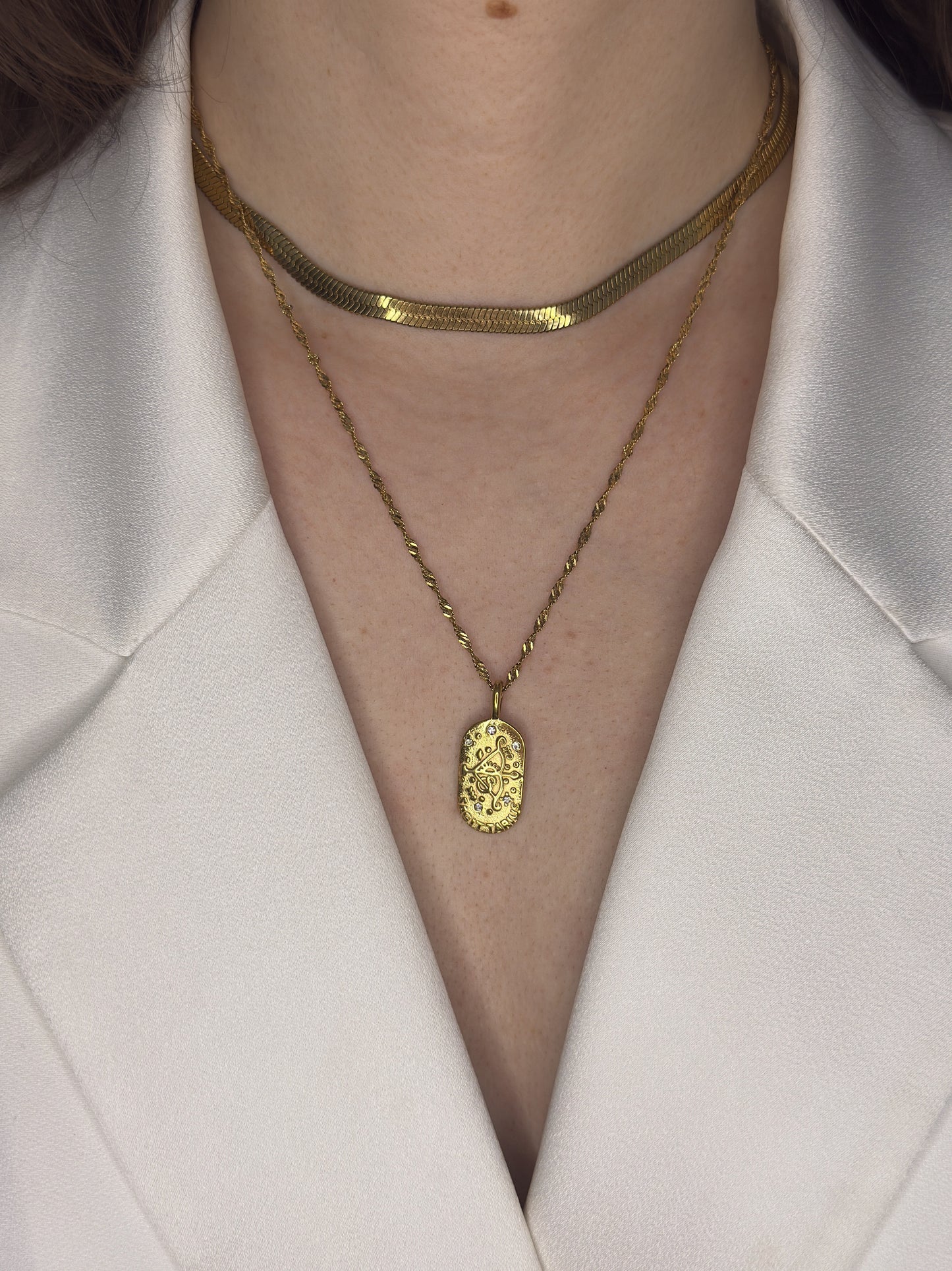The Kiki Sagittarius 18k Gold Plated Stainless Steel Zodiac Starsign Crystal Necklace.