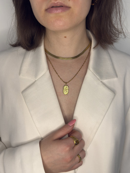 The Kiki Sagittarius 18k Gold Plated Stainless Steel Zodiac Starsign Crystal Necklace.