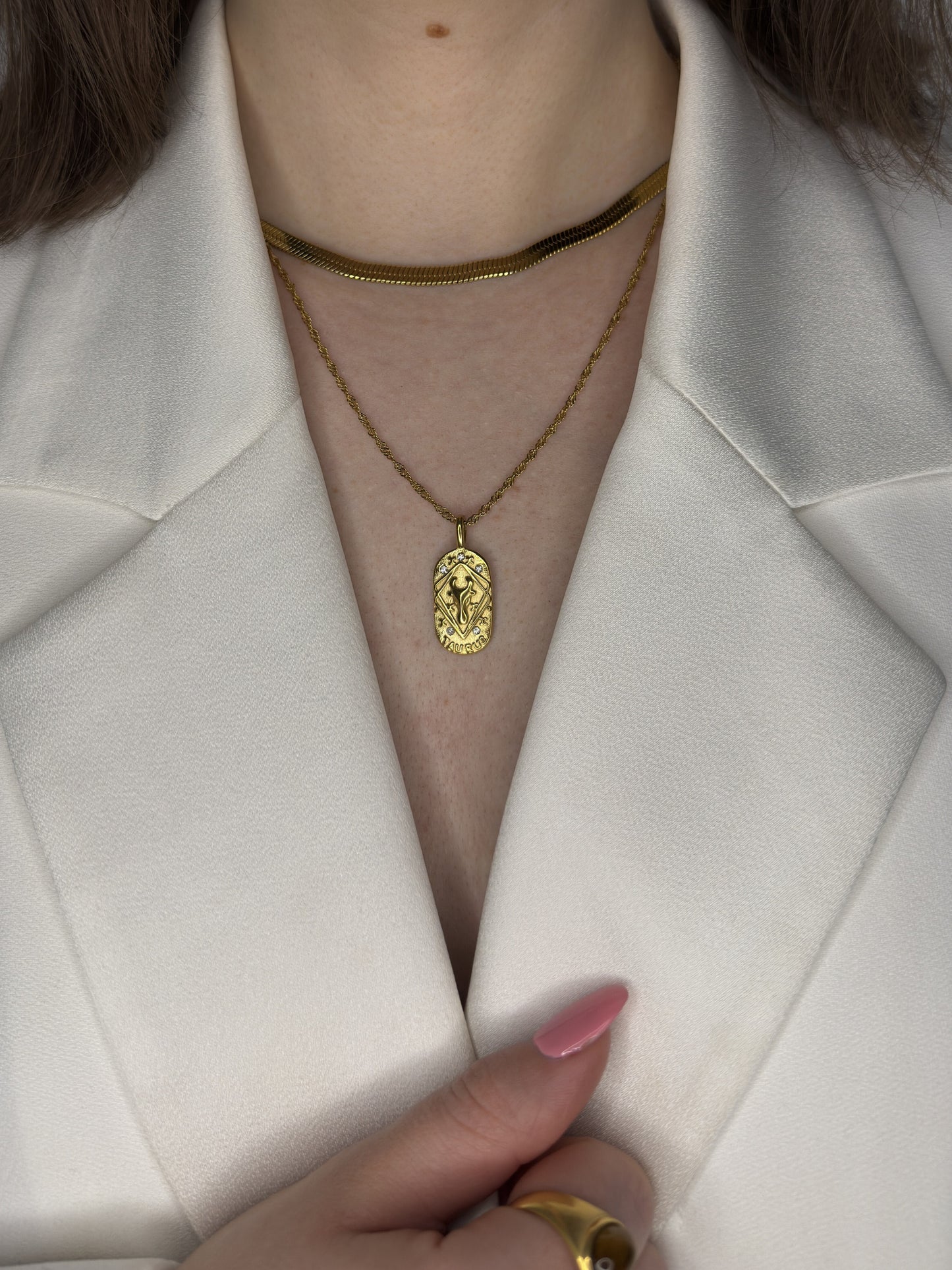 The Kiki Taurus 18k Gold Plated Stainless Steel Zodiac Starsign Crystal Necklace.