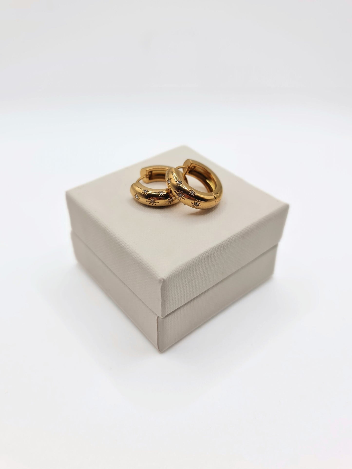 The Jules 18k Gold Plated Stainless Steel Crystal Chubby Huggie Hoop Earrings.
