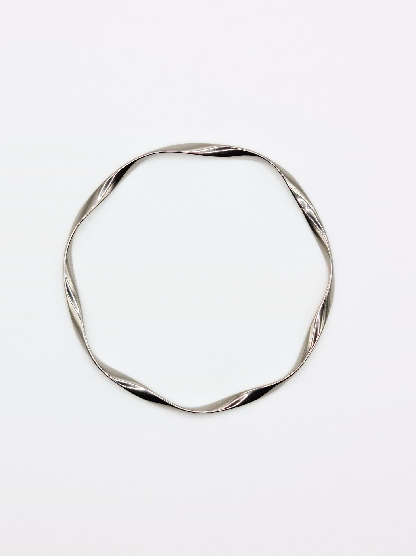 The Wesley Silver Finish Tarnish-Free Wavey Twist Fine Bangle Bracelet