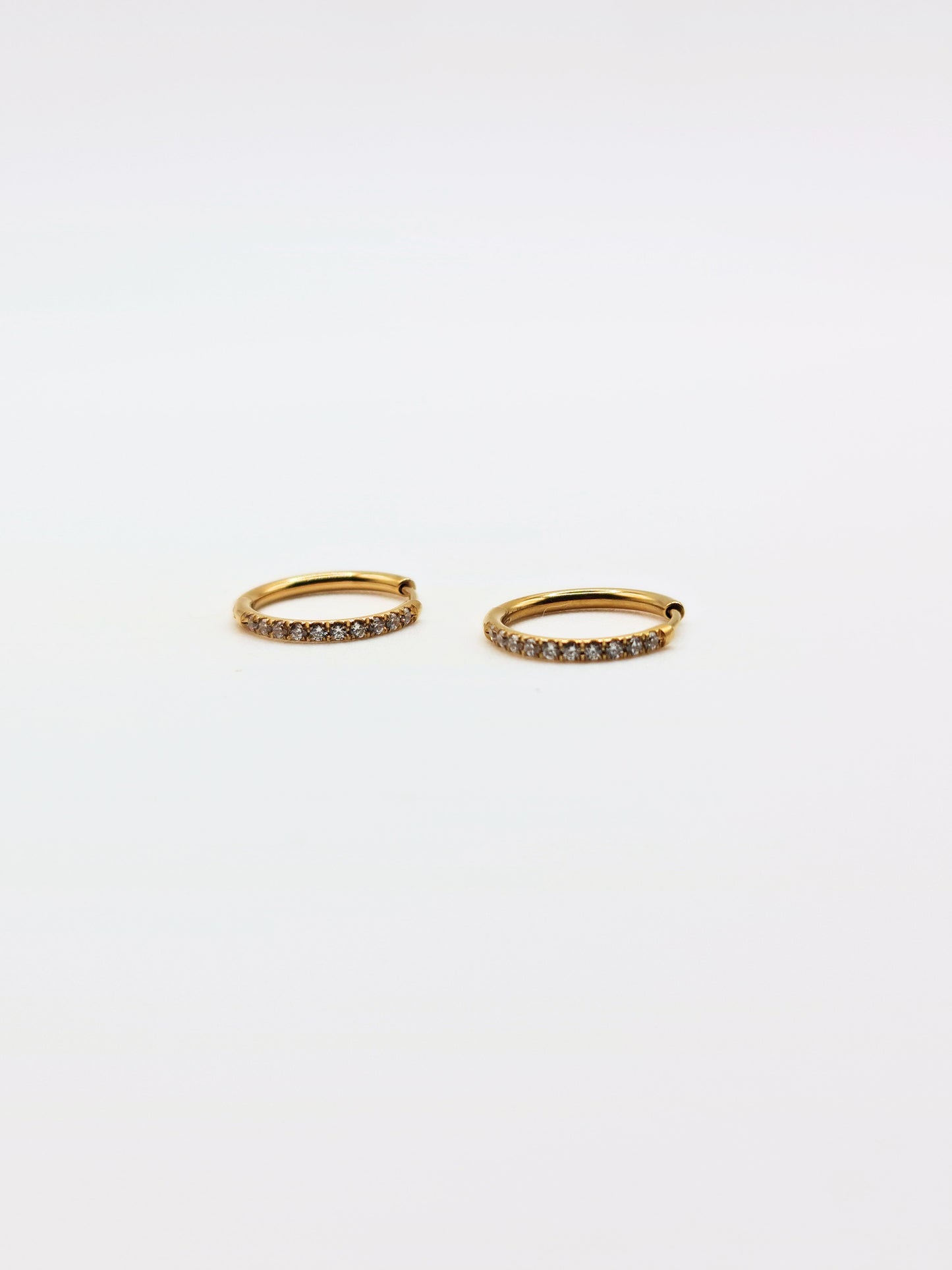 The Alaia Essentials 18k Gold Plated Tarnish-Free Crystal Pave Huggie Hoop Earrings in 12mm