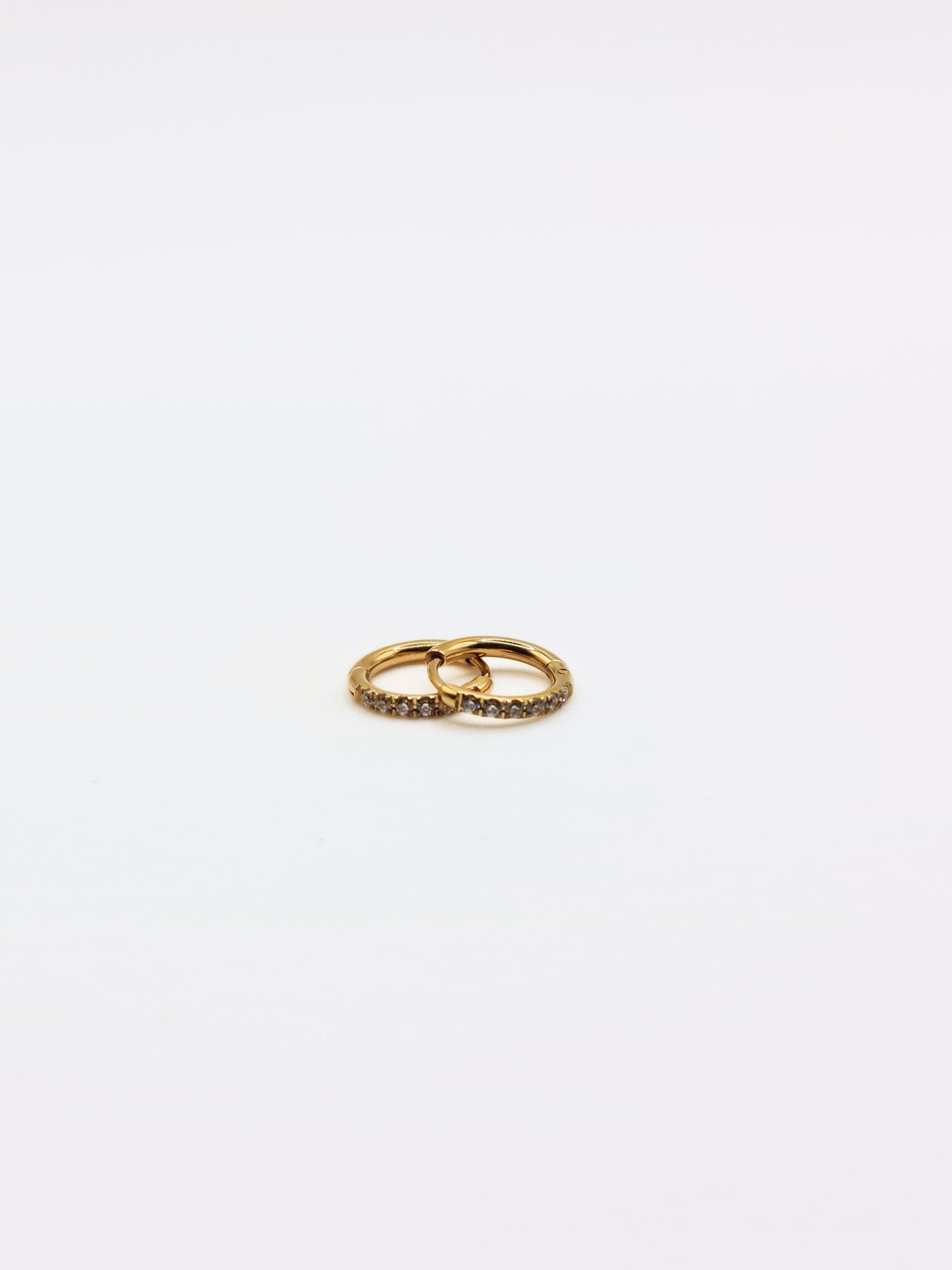 The Alaia Essentials 18k Gold Plated Tarnish-Free Crystal Pave Huggie Hoop Earrings in 8mm