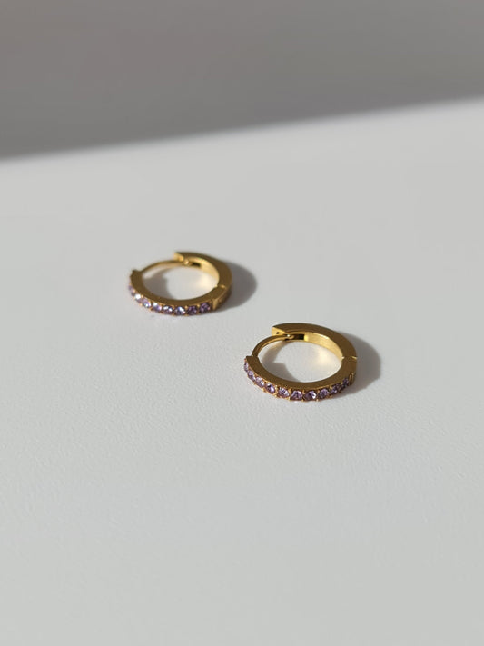 The Maija 'February' Amethyst Birthstone 18k Gold Plated Stainless Steel Crystal Huggie Hoop Earrings.