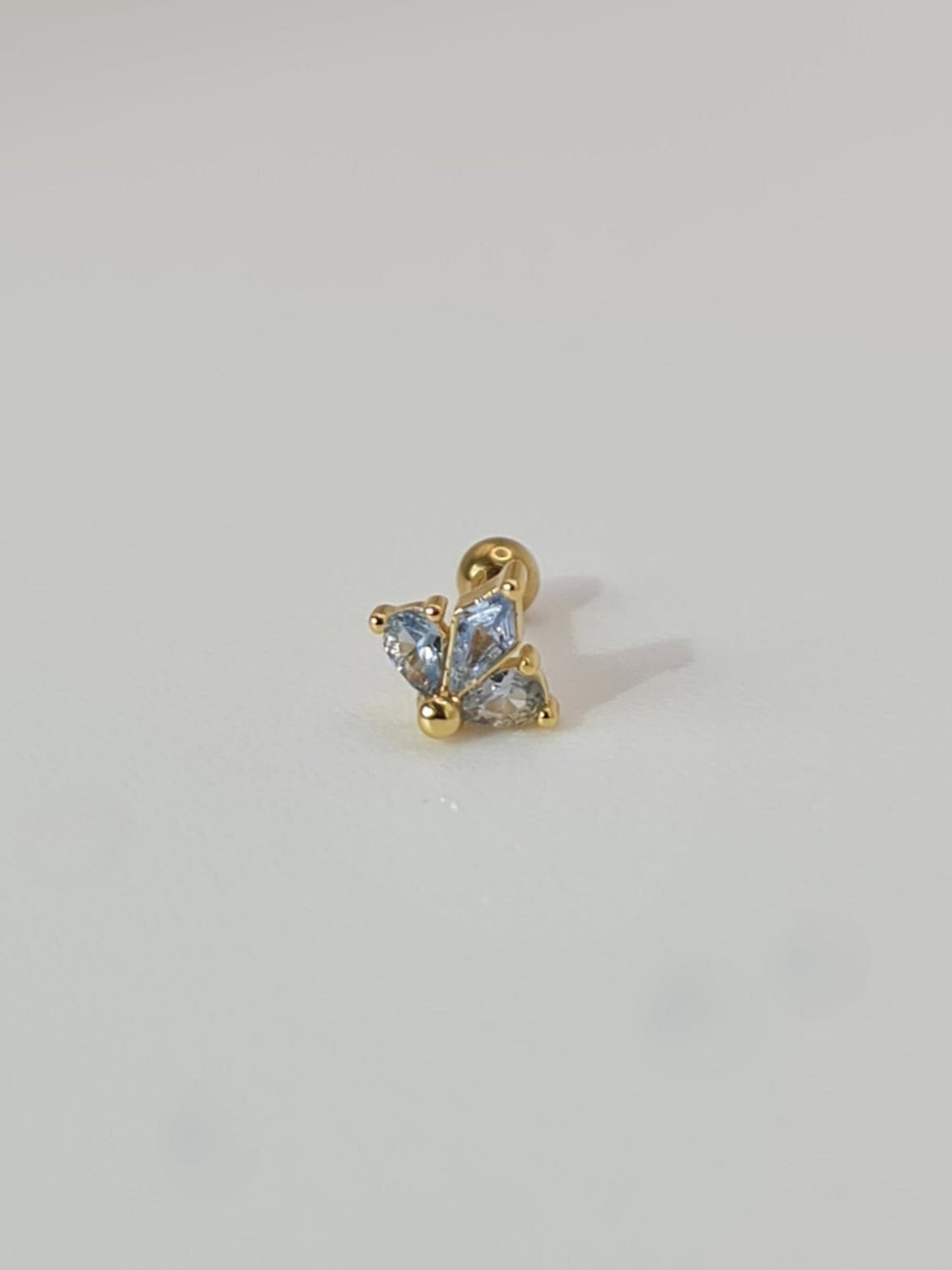The Blake 18k Gold Plated Titanium Steel Cubic Zirconia Cluster Cartilage Lobe Stud Earring in Blue.