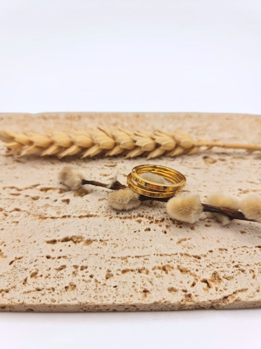 The Aura 18k Gold Plated Stainless Steel Sunburst Layering Ring.