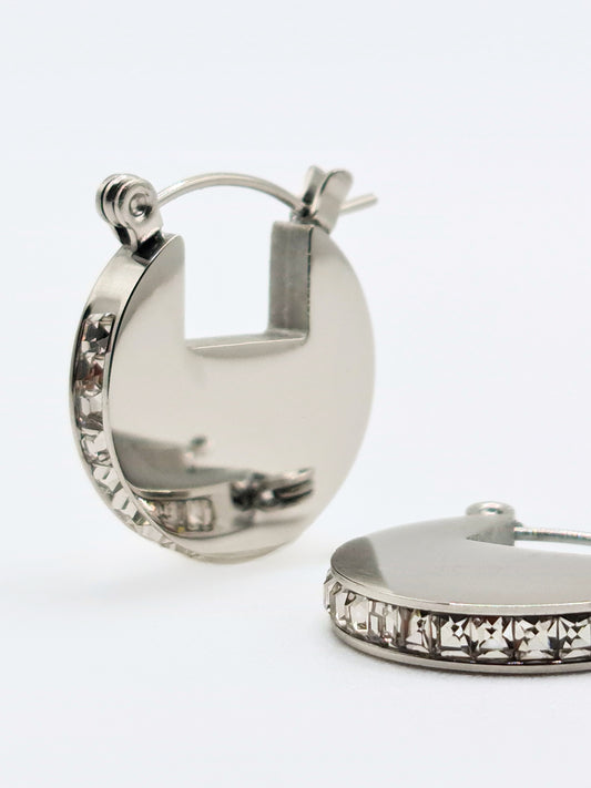 The Discus Silver Finish Tarnish-Free Crystal Disc Hoop Earrings