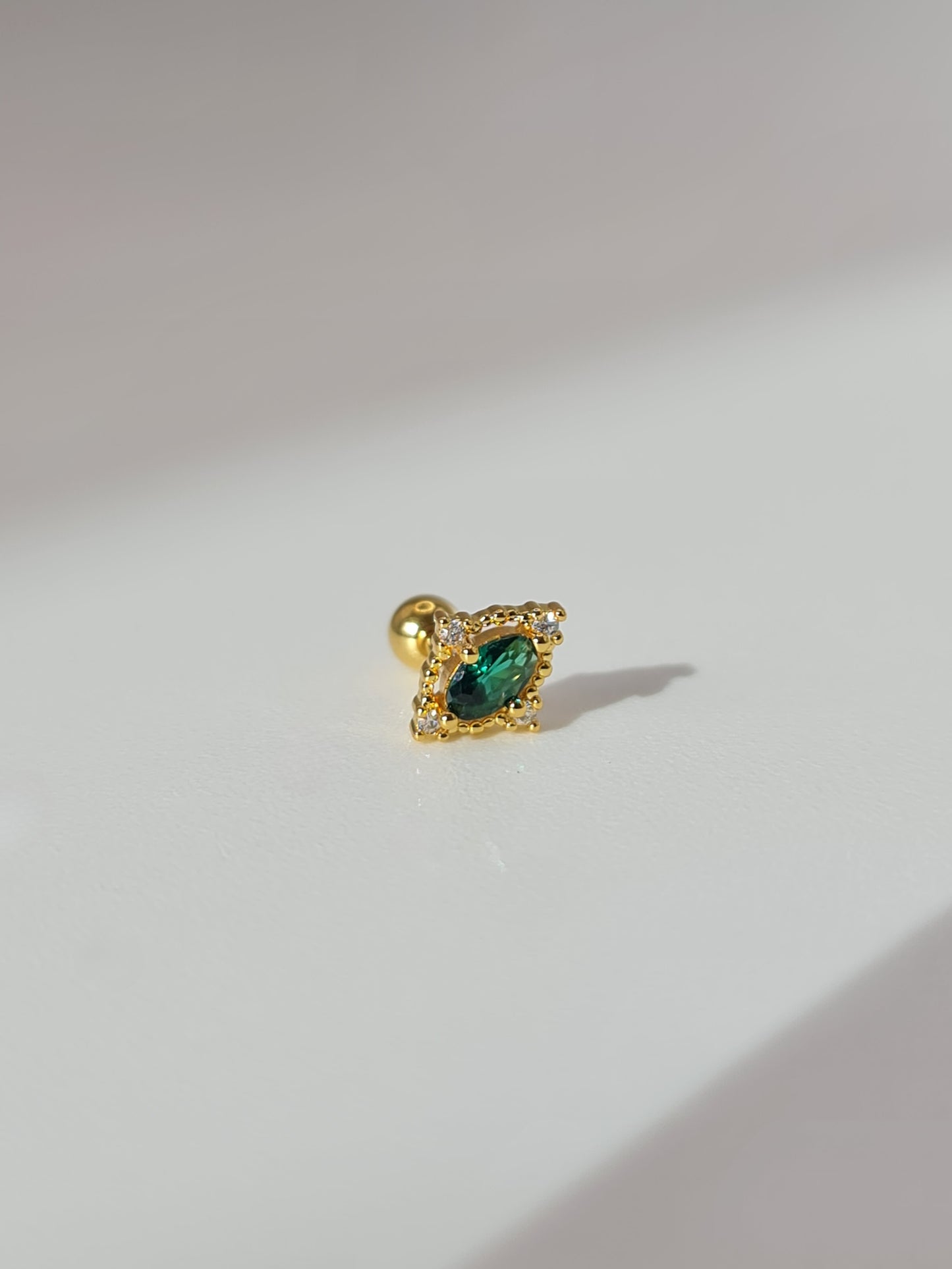 The Charlie 18k Gold Plated Stainless Steel Emerald Cubic Zirconia Cartilage Lobe Single Piercing Stud Earring.