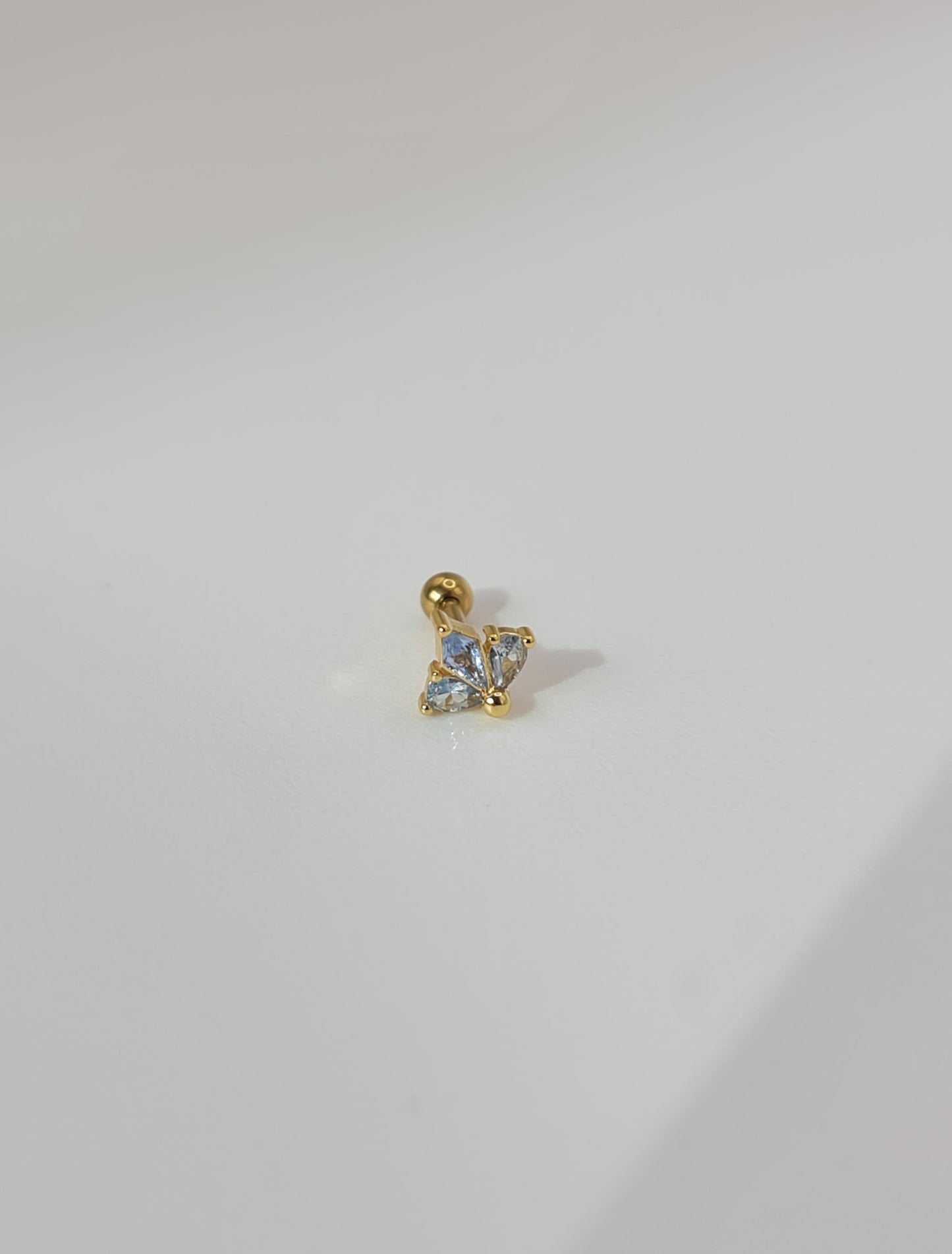 The Blake 18k Gold Plated Titanium Steel Cubic Zirconia Cluster Cartilage Lobe Stud Earring in Blue.