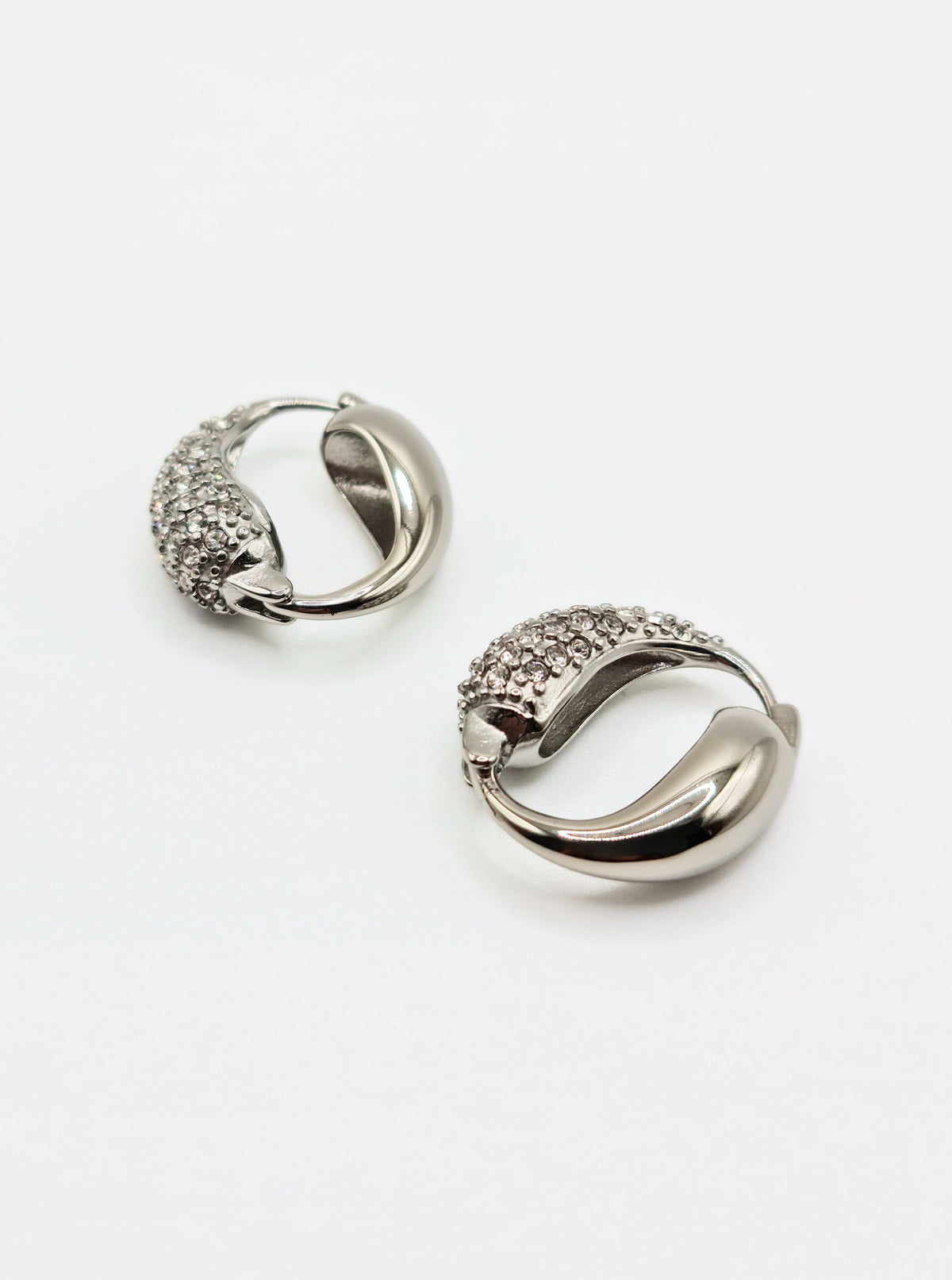 The Corinthos Silver Finish Tarnish-Free Crystal Pave Abstract Hoop Earrings