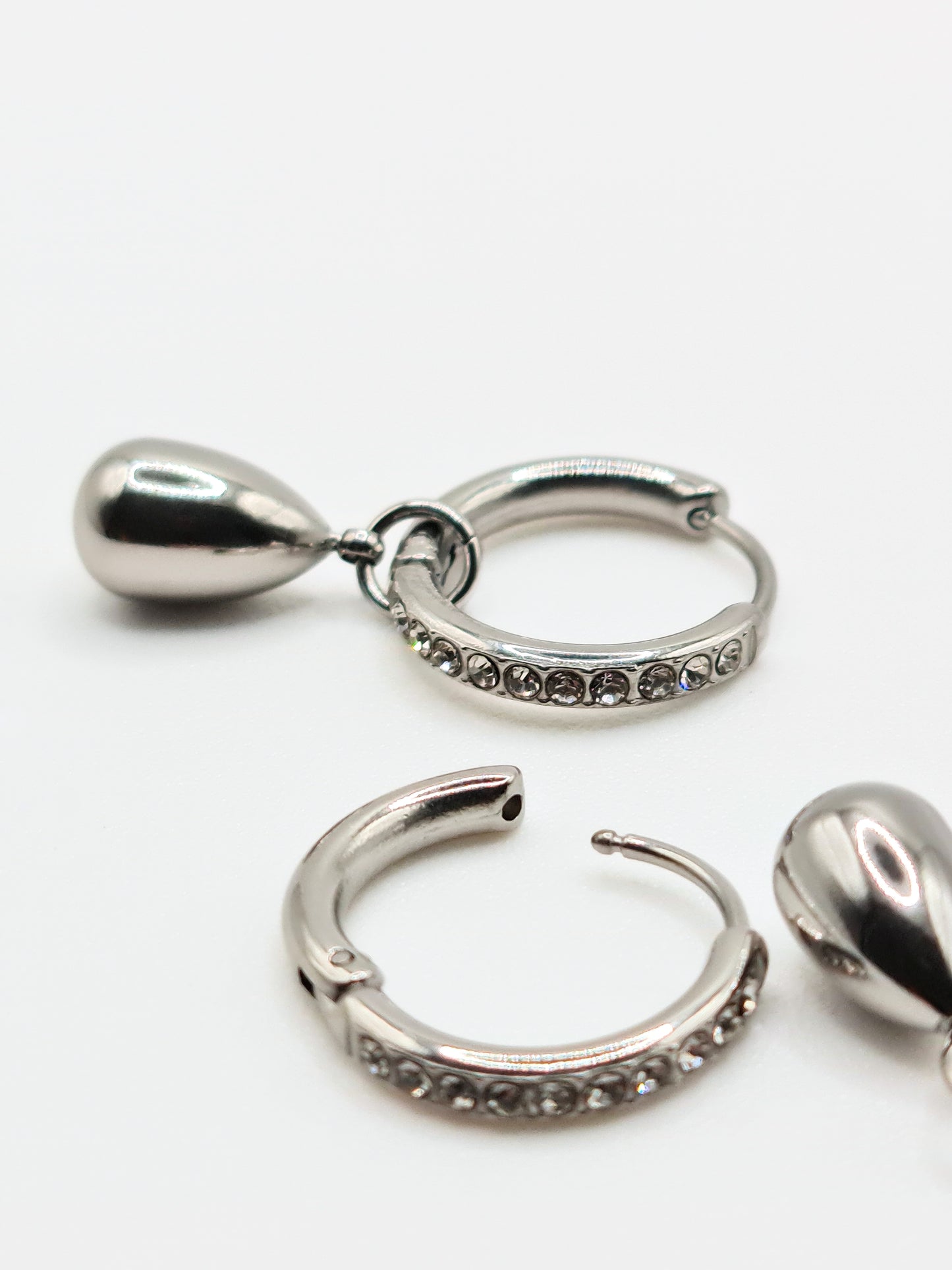 The Orbital Silver Finish Tarnish-Free Ball Drop Pave Hoop Earrings