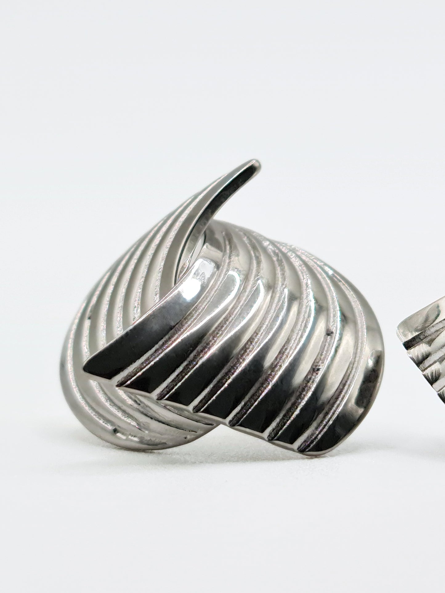 The Curlew Silver Finish Tarnish-Free Statement Crossover Stud Earrings