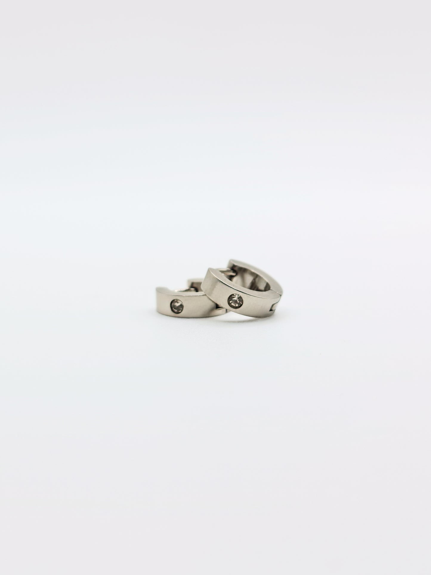 The Maddy Essentials Silver Finish Tarnish-Free Crystal Mini Huggie Hoop Earrings