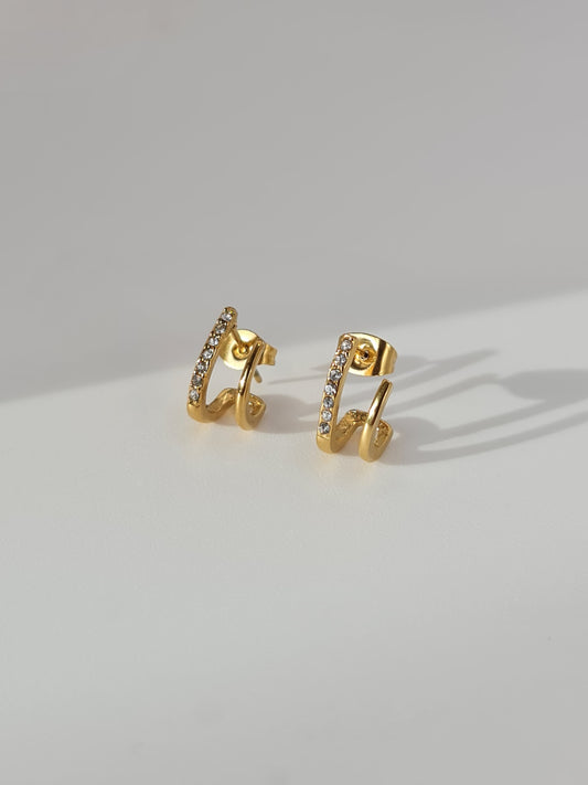 The Illusion 18k Gold Plated Stainless Steel Pave Crystal Double Hoop Earrings.