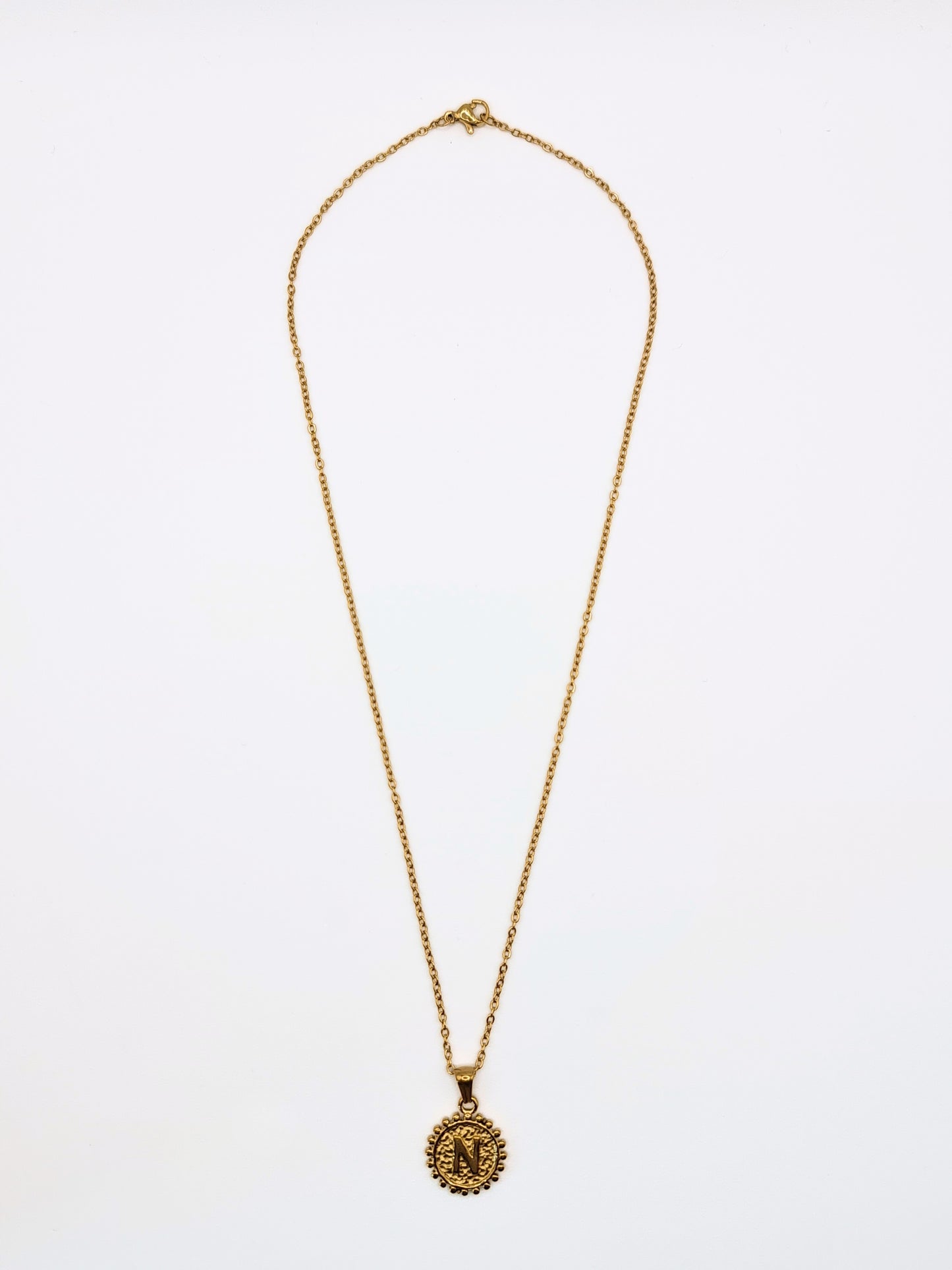 The Talisman Collection 'N' Initial 18k Gold Plated Stainless Steel Ball Trim Pendant Necklace.