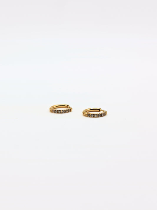 The Alaia Essentials 18k Gold Plated Tarnish-Free Crystal Pave Huggie Hoop Earrings in 8mm