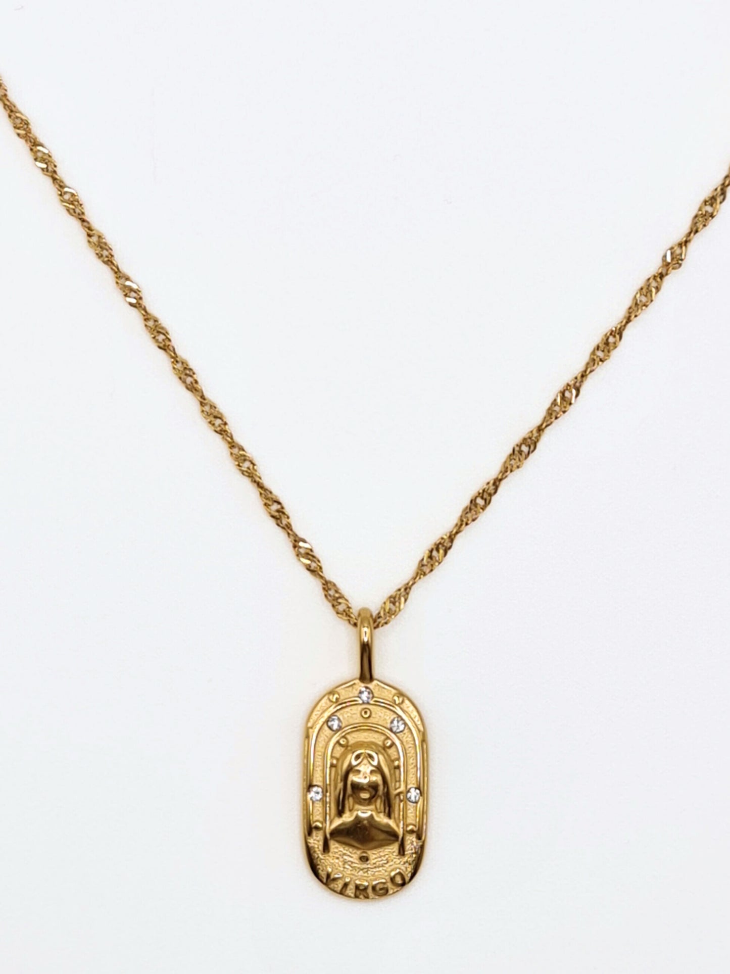 The Kiki Virgo 18k Gold Plated Stainless Steel Zodiac Starsign Crystal Necklace.