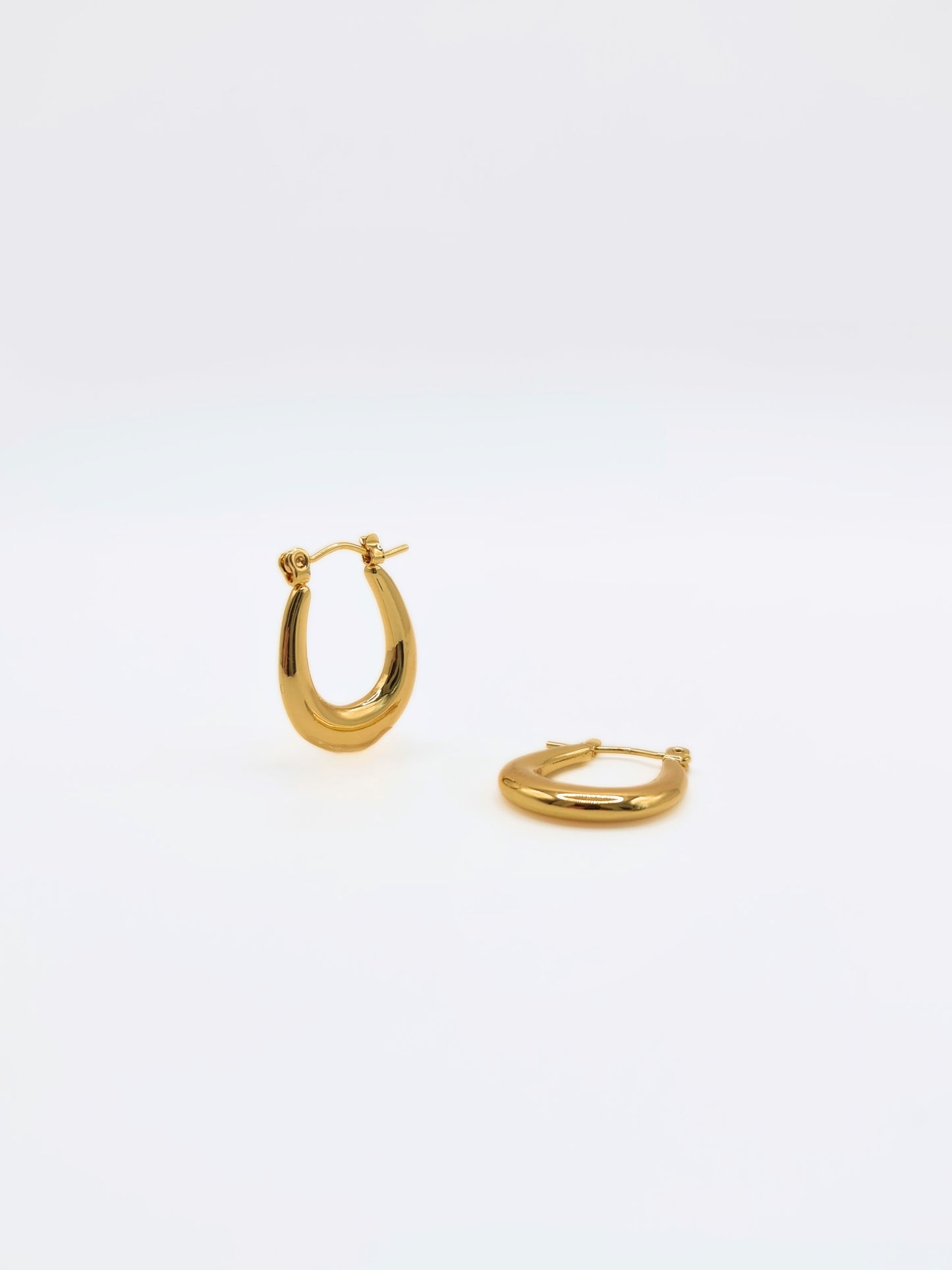 The Duke 18k Gold Plated Stainless Steel Oval Hoop Earrings.