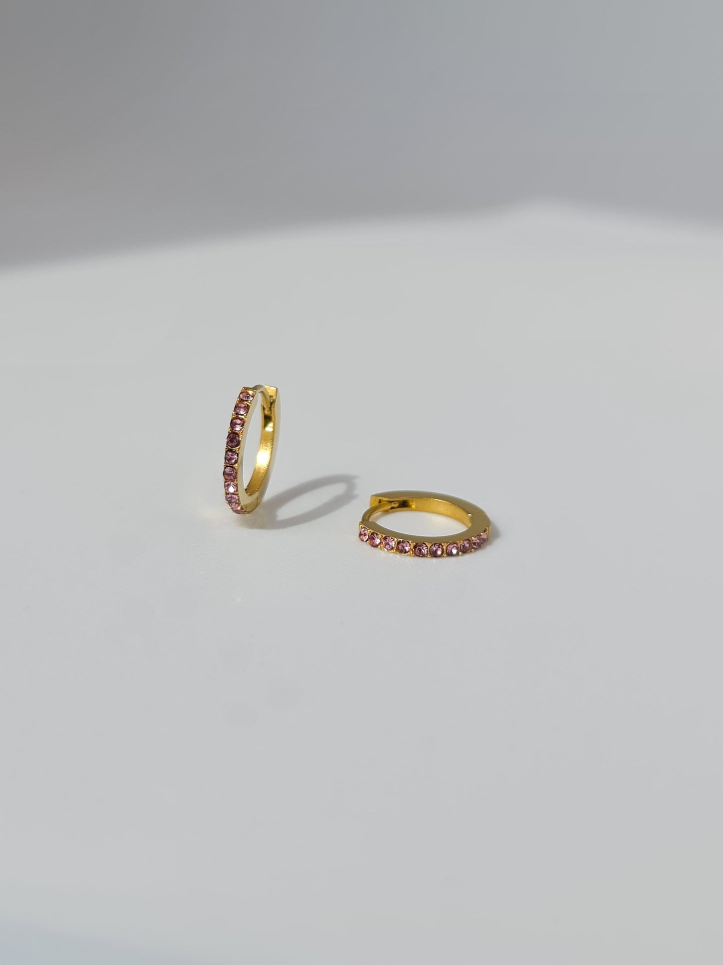 The Maija 'June' Alexandrite Birthstone 18k Gold Plated Stainless Steel Crystal Huggie Hoop Earrings.