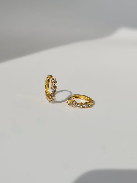 The Aurora 18k Gold Plated Stainless Steel Cubic Zirconia Pave Crystal Celestial Constellation Huggie Hoop Earrings.