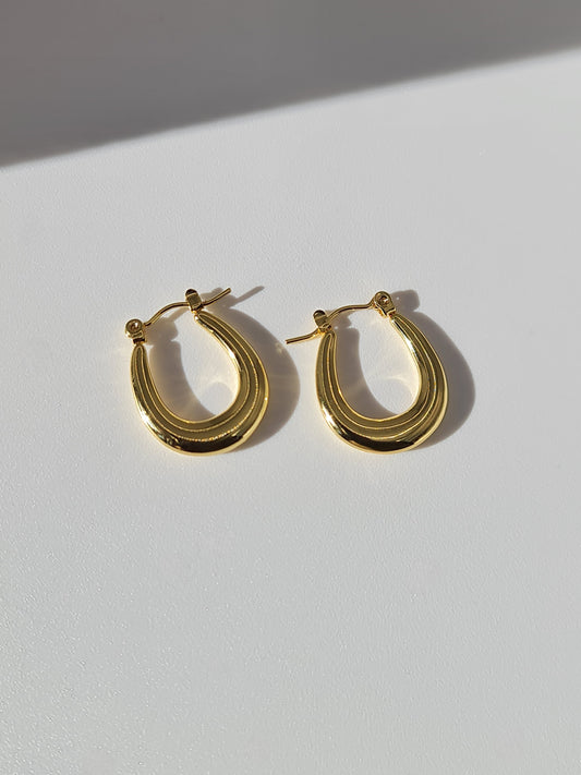 The Duke 18k Gold Plated Stainless Steel Oval Hoop Earrings.