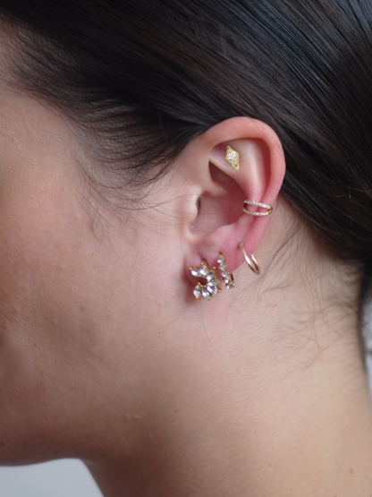 The Jordan 18k Gold Plated Titanium Steel Cubic Zirconia Diamond Cut Dagger Cartilage Lobe Single Piercing Stud Earring.
