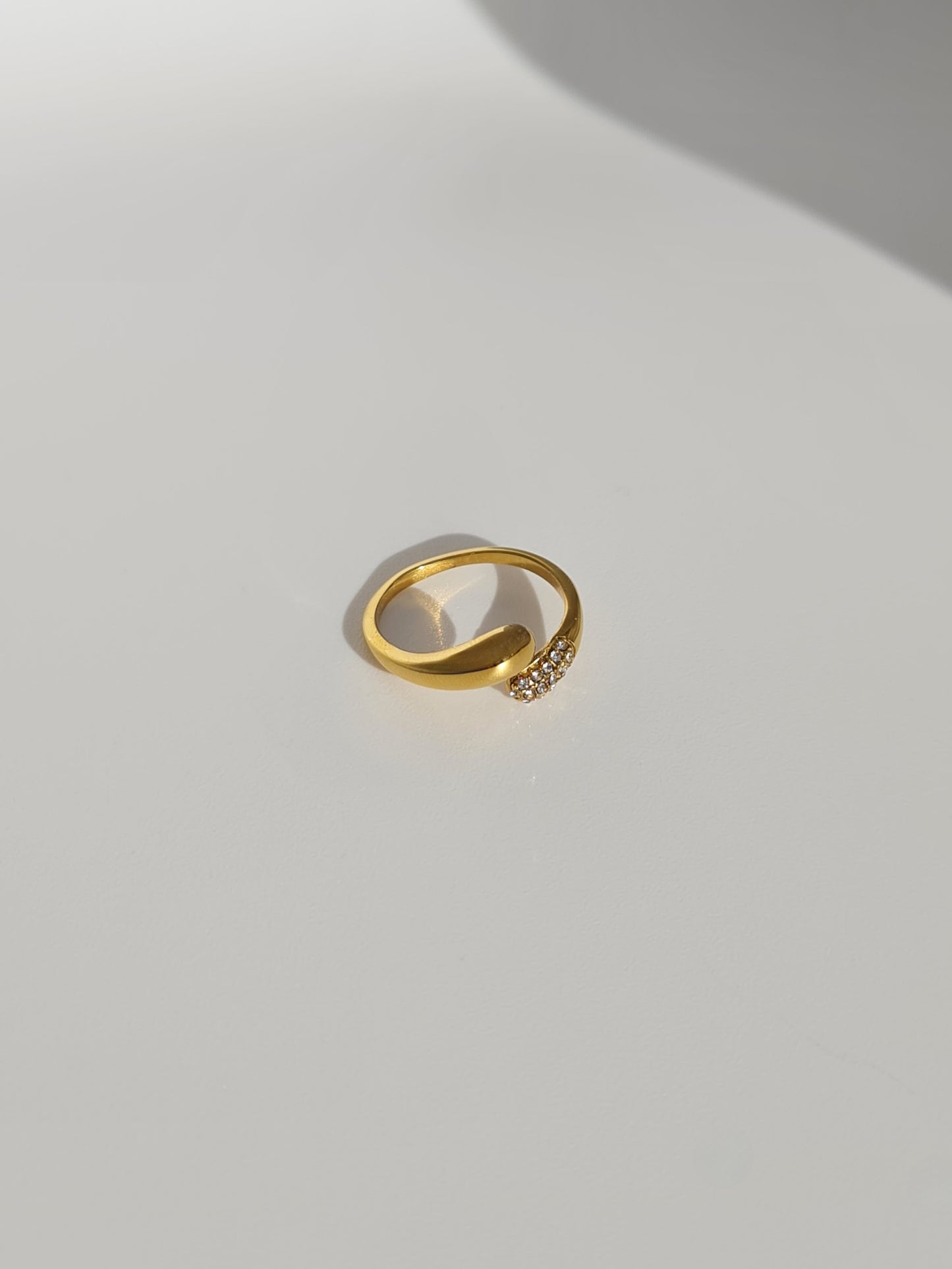The Twist 18k Gold Plated Stainless Steel Pave Crystal Dome Open Band Stacking Ring.