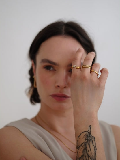 The Hope 18k Gold Plated Stainless Steel Crystal Celestial Wavy Ring.