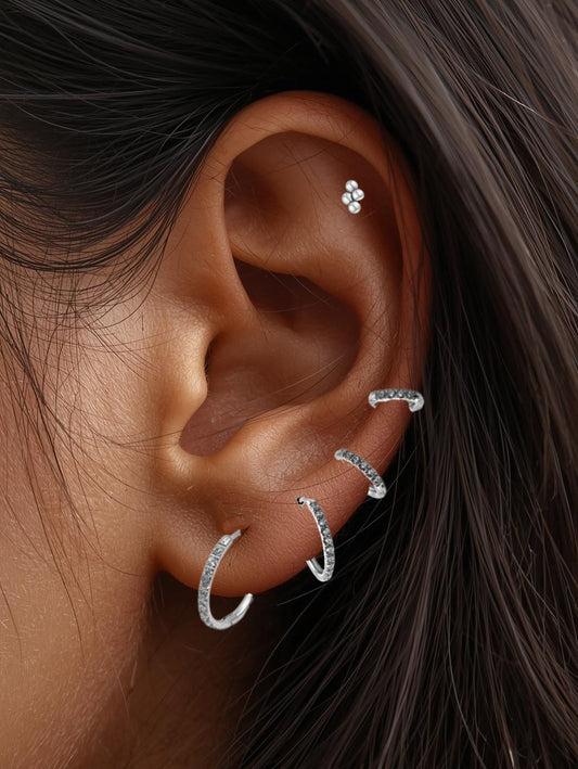 The Alaia Essentials Silver Finish Tarnish-Free Crystal Pave Huggie Hoop Earrings in 6mm