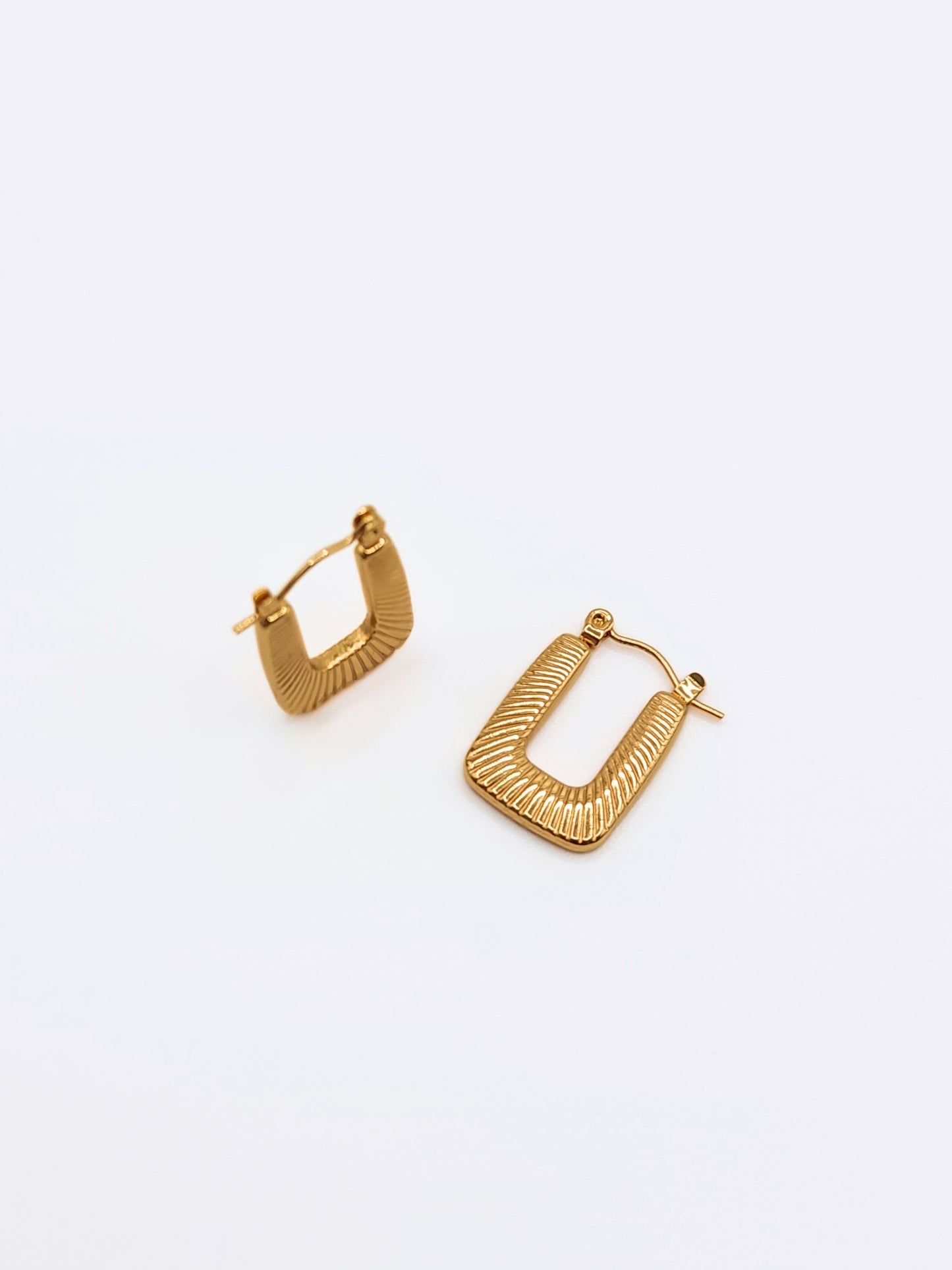 The Arthur 18k Gold Plated Stainless Steel Etched Rectangle Hoop Earrings.