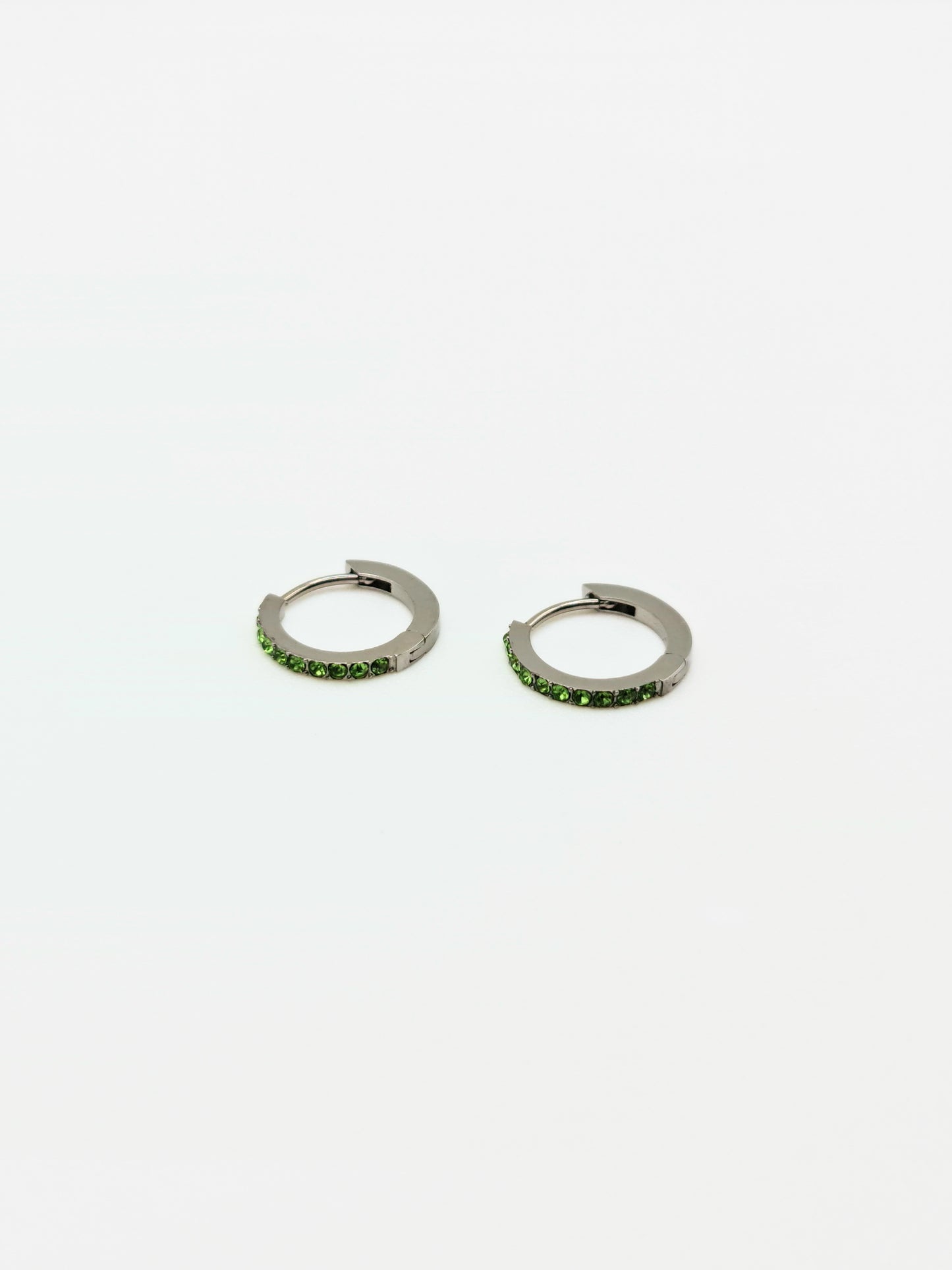 The Maija 'August' Peridot Birthstone Silver Finish Tarnish Free Crystal Huggie Hoop Earrings.
